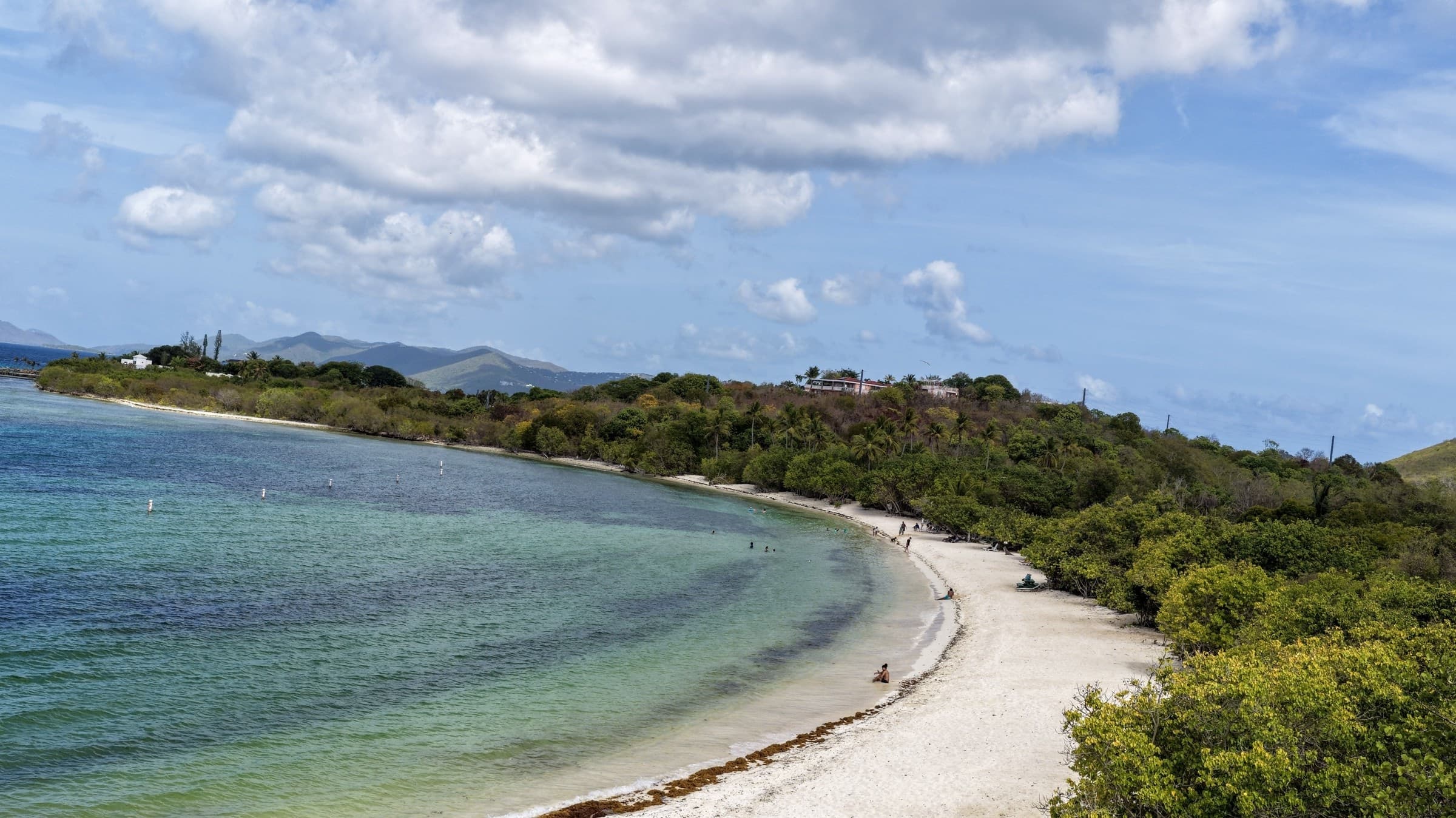 Aerial view of pale sand and calm water at Lindquist Beach in Smith Bay, St. Thomas.